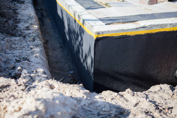 Professional Exterior Waterproofing technician working in Irvington, NY